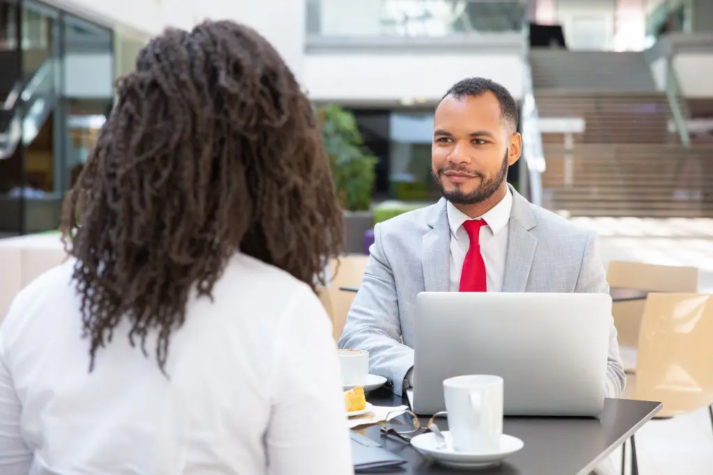 friendly-diverse-business-colleagues-working-project (1).webp